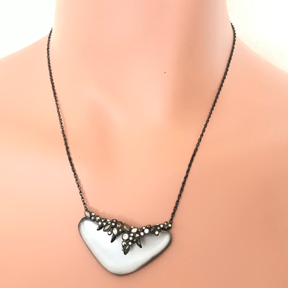 Alexis Bittar grayish lucite pendant necklace w/crystals in gunmetal setting.